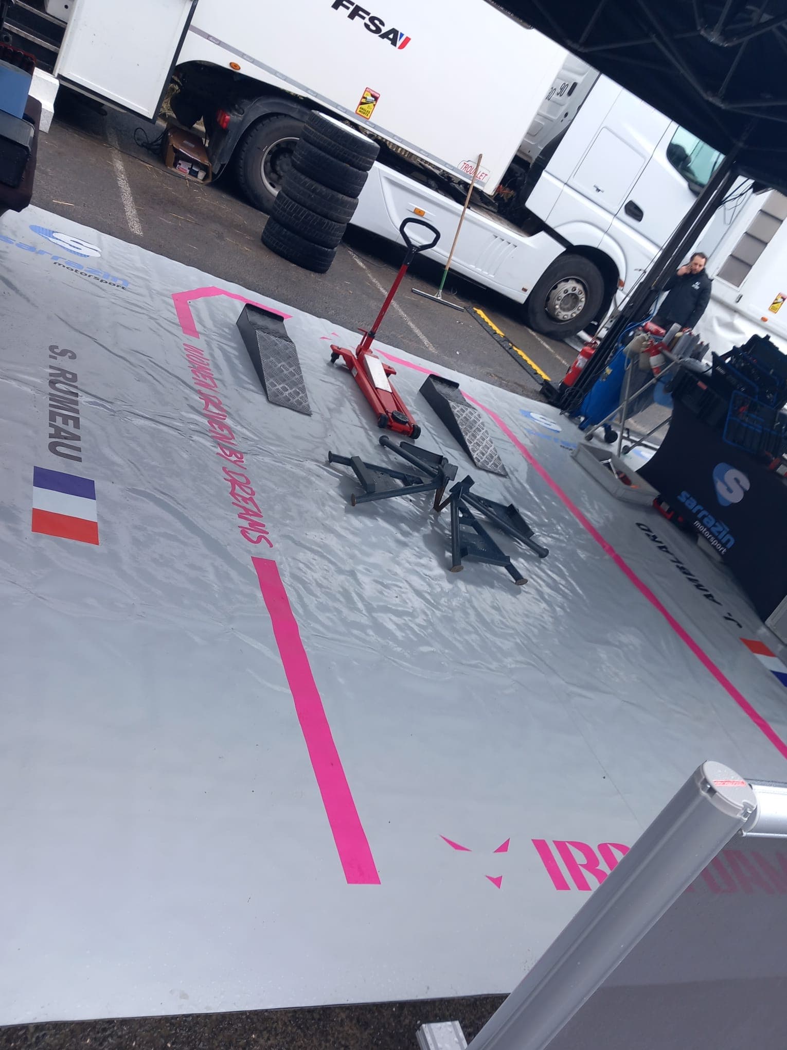 Ground tarpaulin and tent detail close up