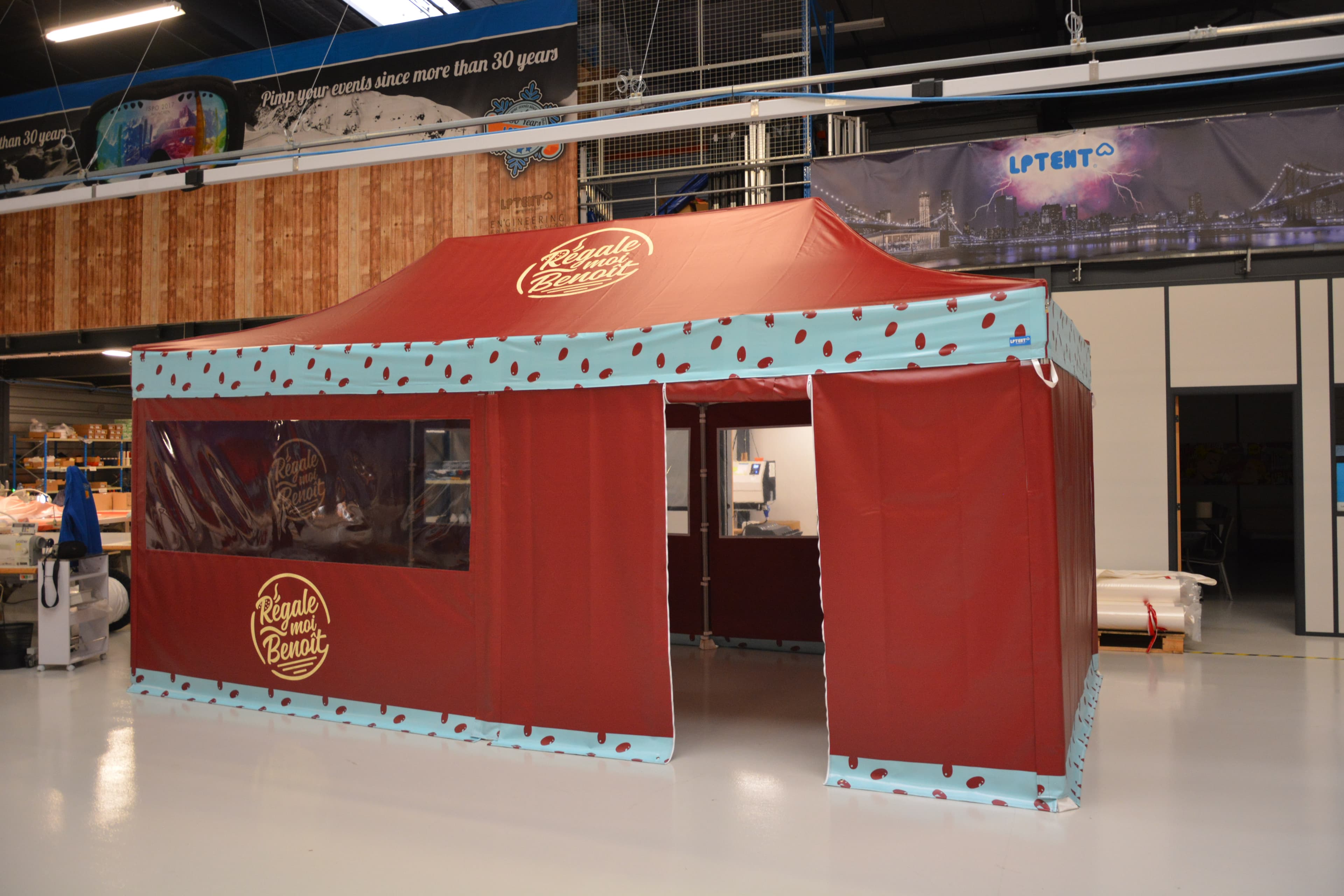 Custom-branded LP Tent pagoda with printed side panels in the LP Tent showroom